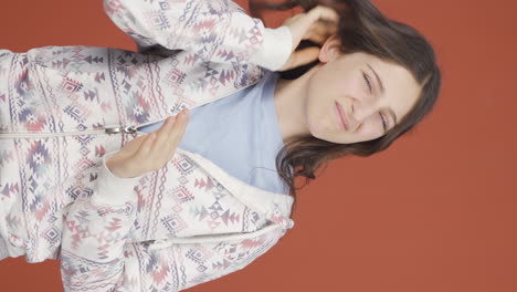 Vertical-video-of-Young-woman-with-itchy-ears.